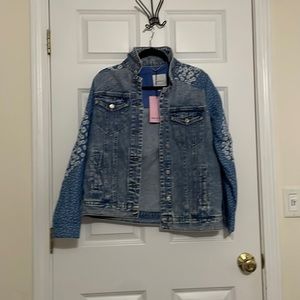 Brand-new never worn jean jacket tags on